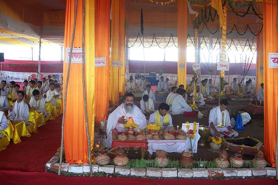 On first day of Chaitra Navararti 2009 Shri Lakshchandi Mahayagya sankalpa was taken by Brahmachari Girish Ji at Gurudev Brahmanand Saraswati Ashram, Chhan, Bhopal. Since then 4 Shri Lakshchandi Mahayagyas have completed and 5th one is continuing. In Lakshchandi Yagya 1,00,000 paath (chanting) of Shri Durga Saptshati is done with 70,000 ahuties (offerings) in 9 Dhawan kunds (fire pits).
